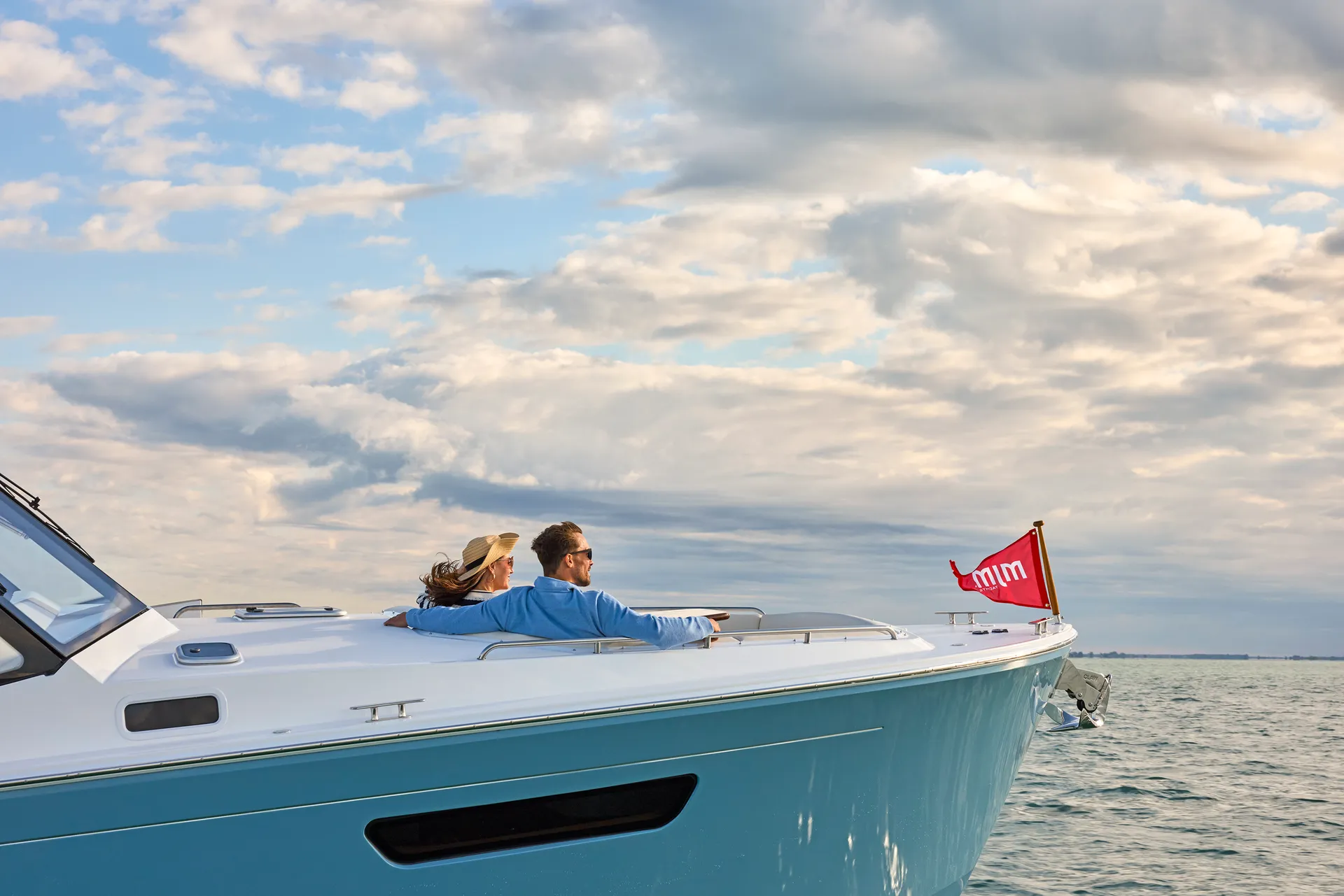 Couple enjoying a sea trial on an MJM yacht