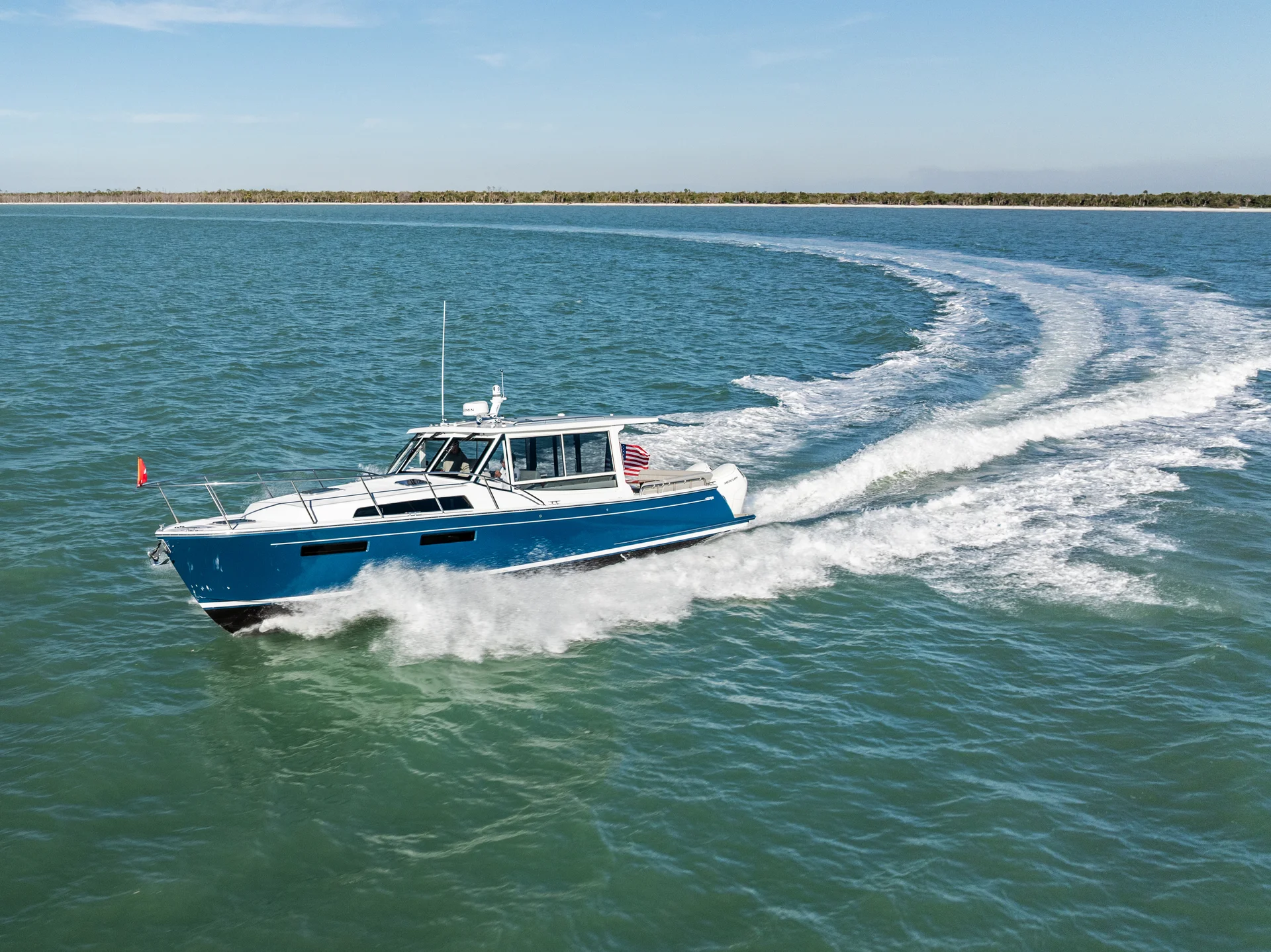 MJM 47R luxury cruiser on the water