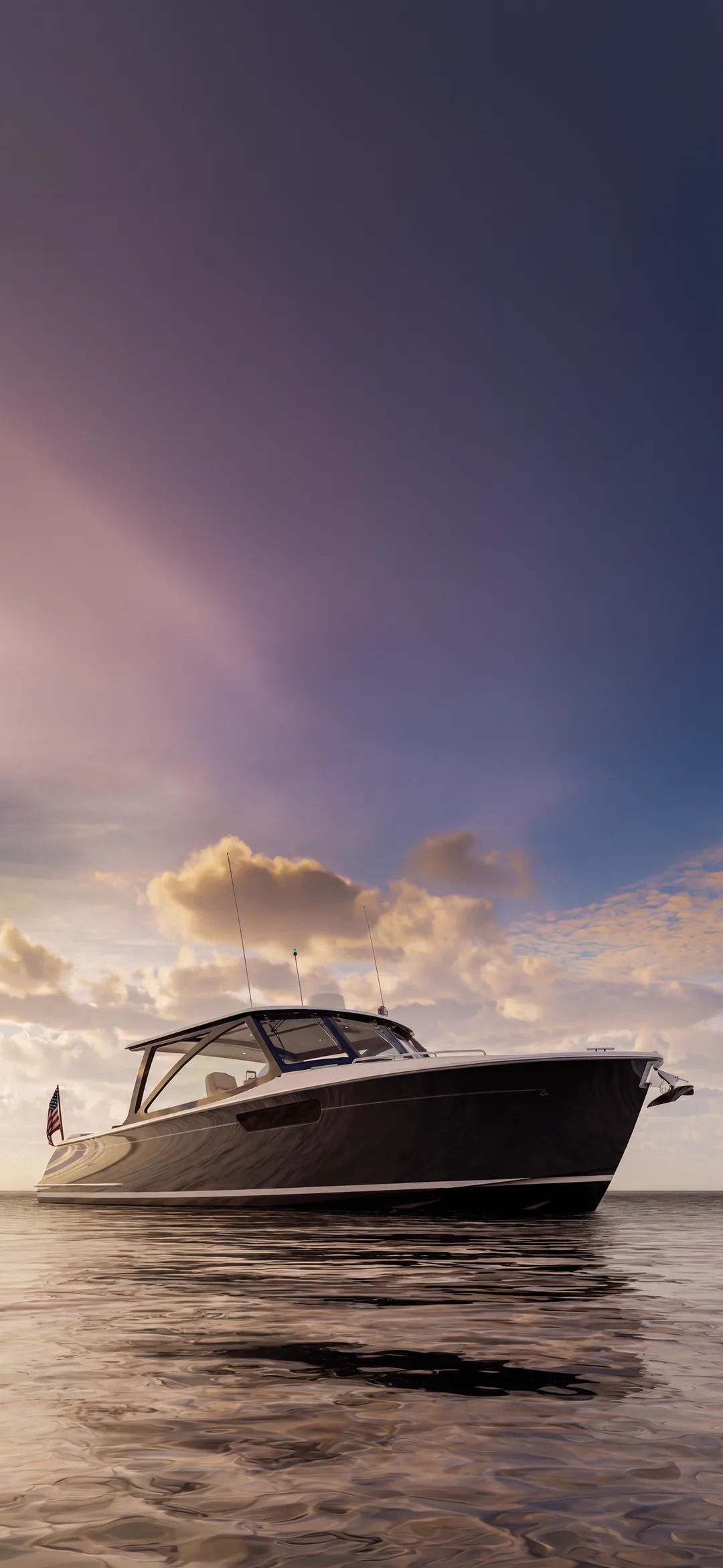 MJM 38V at anchor on calm water at sunset