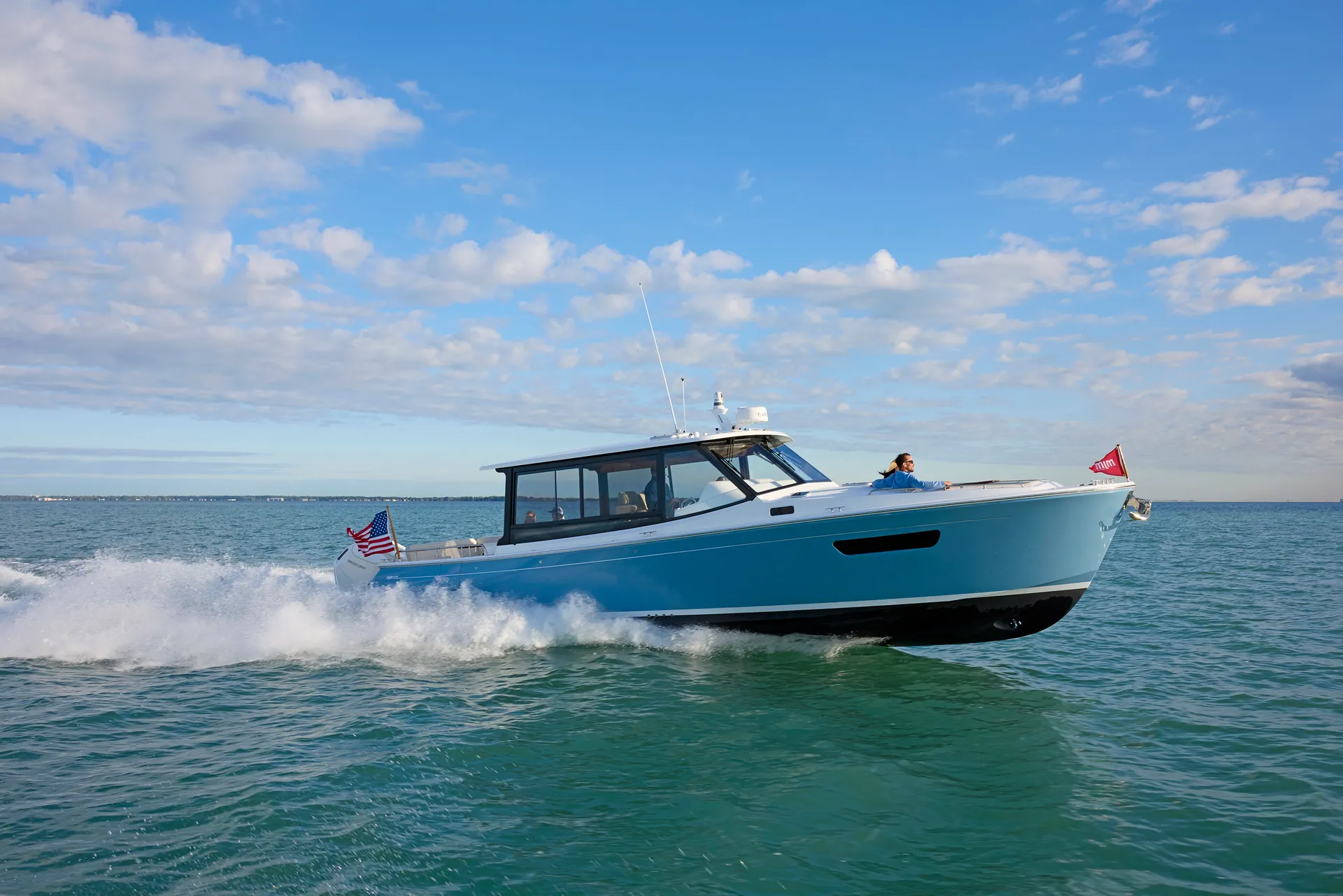 MJM 47X adventure day cruiser on the water